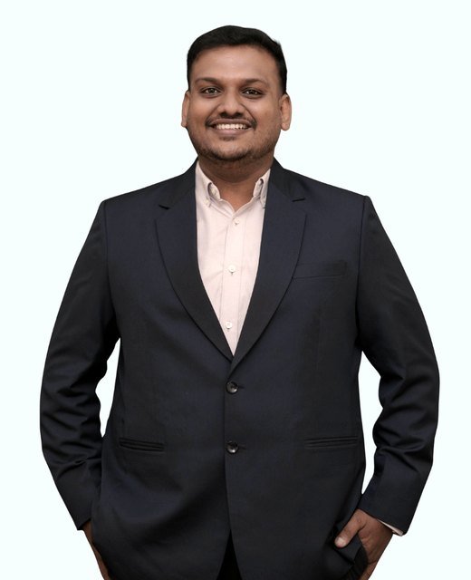 Dr. Nikhilkumar Gudla, Microscopic Endodontist at Roots Dental Care